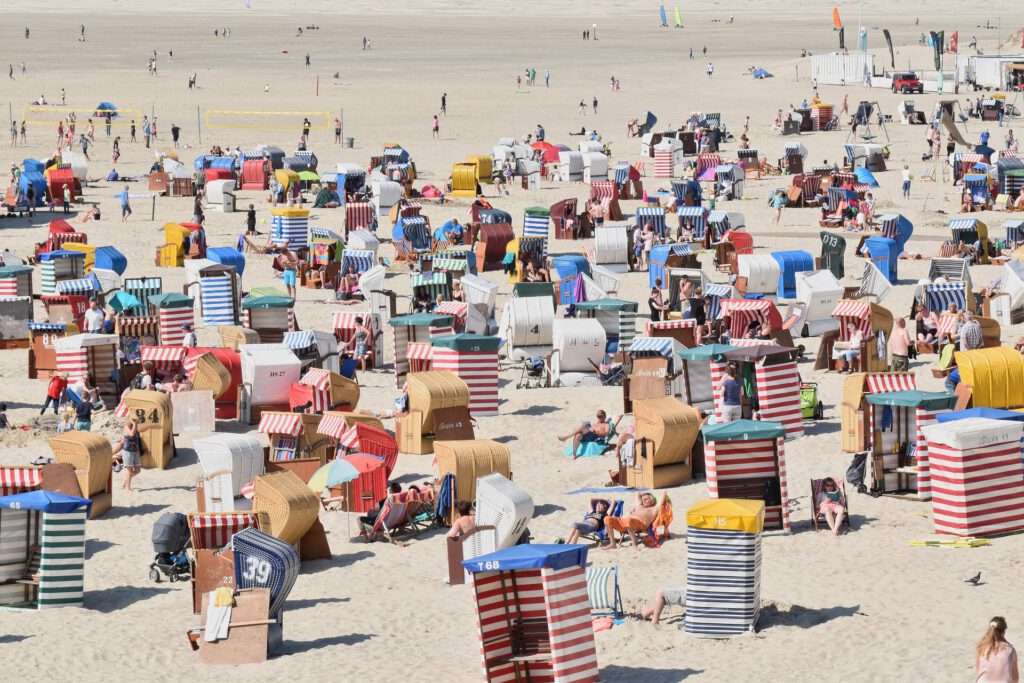 Dont vacation in England - Beach with lots of beach chairs and people