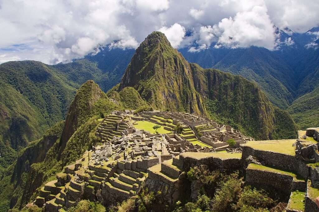 a stone ruins on a mountain. 