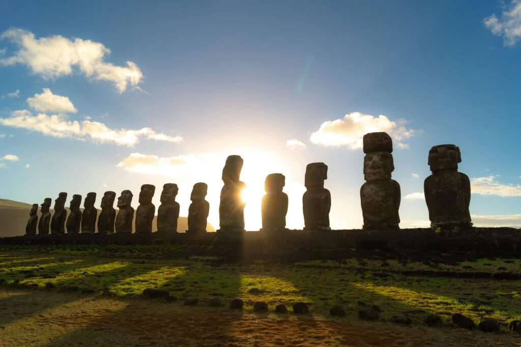 a row of statues in a row. Sunrise too. a perfect trip to travel. another world.